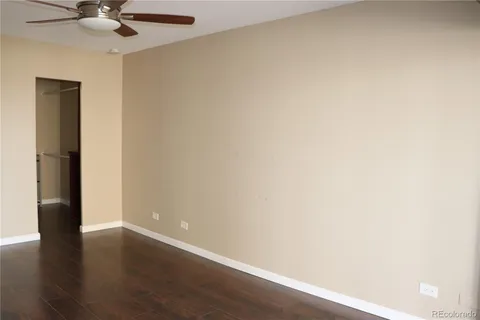 a view of a small space with wooden floor
