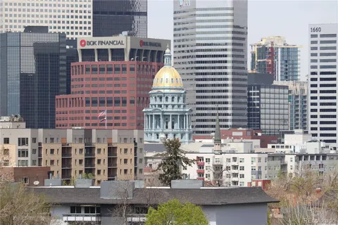 a view of building with glass windows