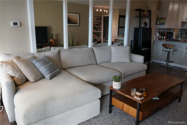 a living room with furniture and a couch