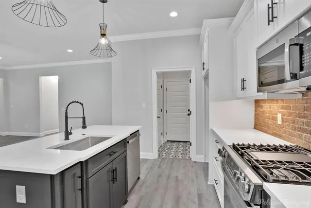 a view of kitchen with wooden floor