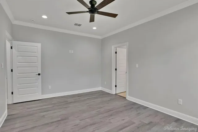a kitchen with stainless steel appliances a sink stove and refrigerator