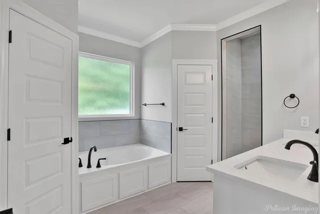 a view of living room with granite countertop furniture a fireplace and wooden floor