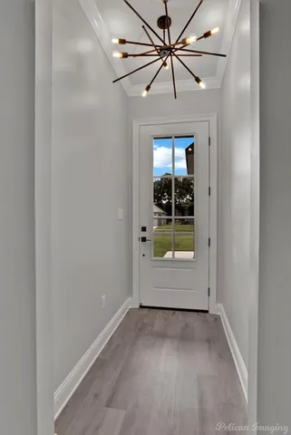 an empty room with an empty space and a ceiling fan