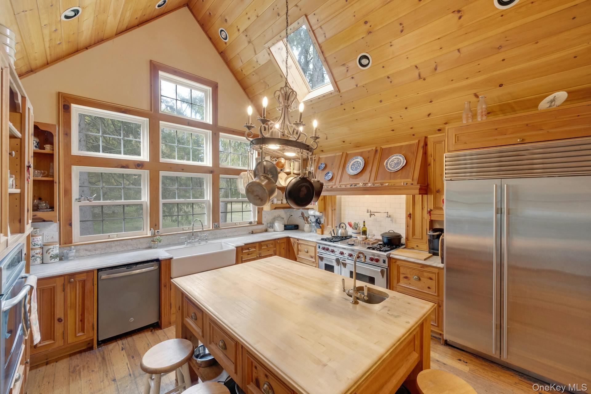 209 Hardscrabble Road North Salem, NY 10560 - Photo 11 of 40 a kitchen with a sink a stove and a refrigerator