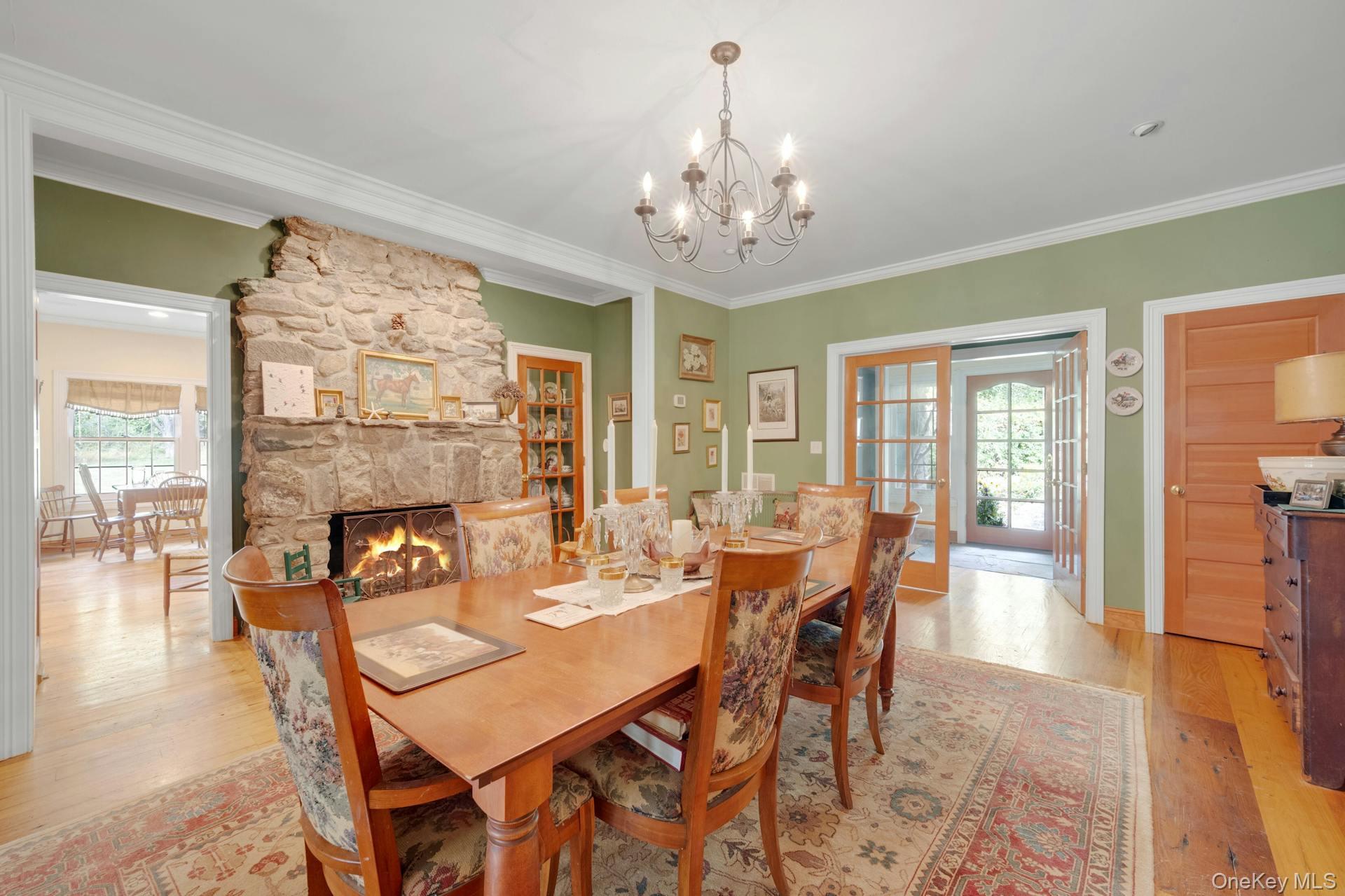 209 Hardscrabble Road North Salem, NY 10560 - Photo 14 of 40 a view of a dining room with furniture wooden floor and chandelier