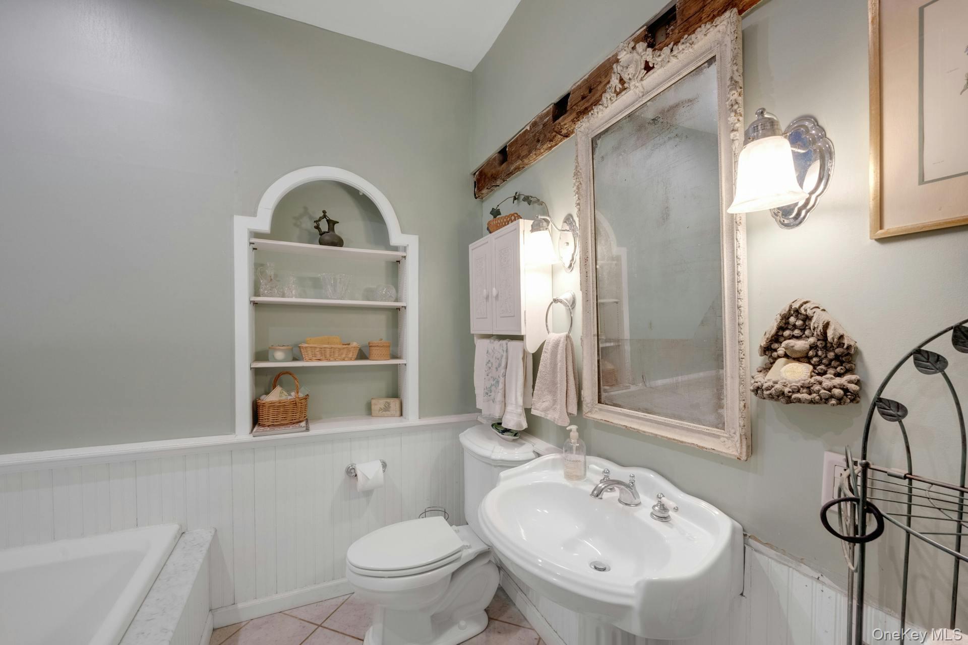 209 Hardscrabble Road North Salem, NY 10560 - Photo 21 of 40 a bathroom with a sink a toilet and a mirror