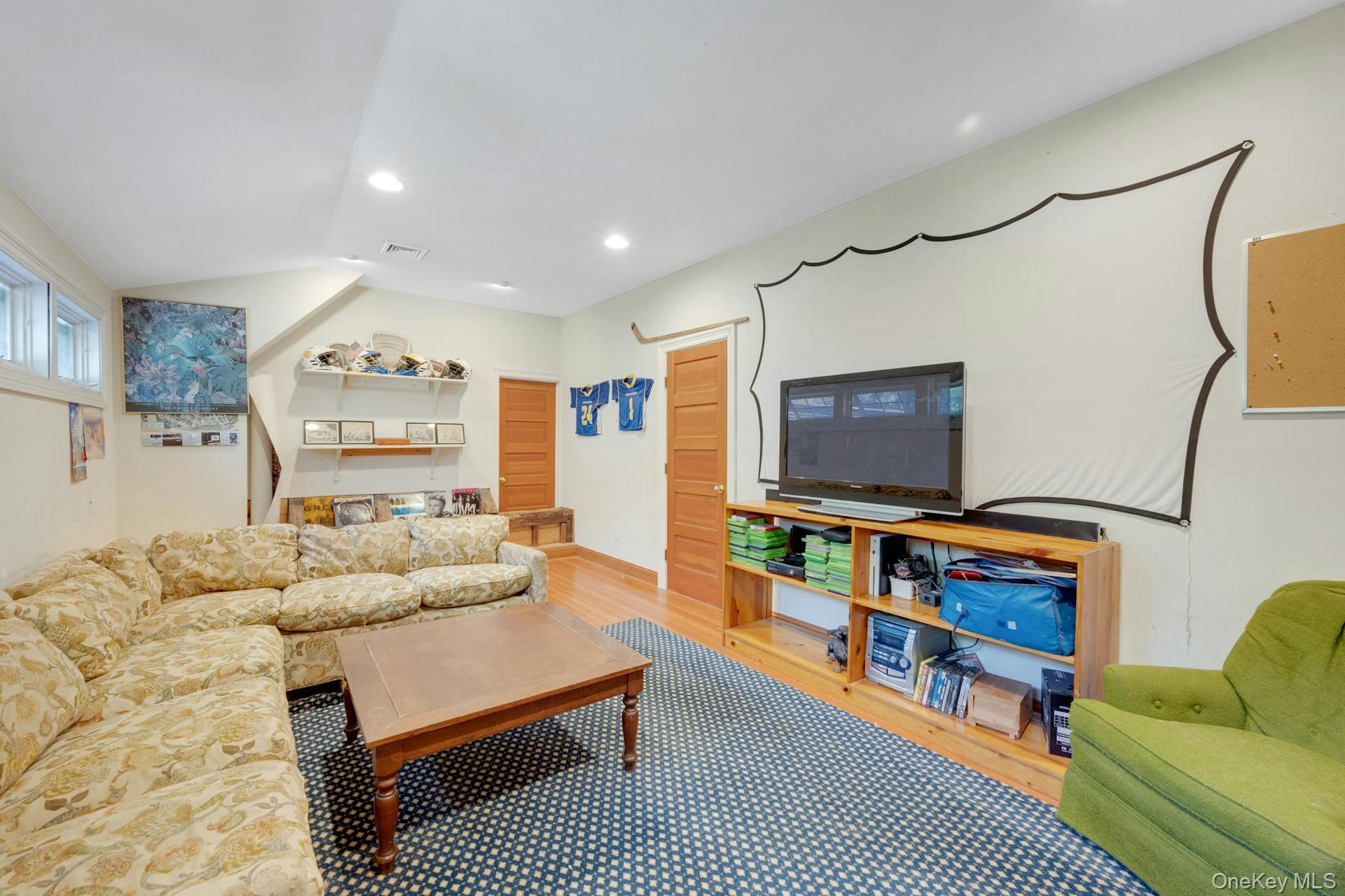 209 Hardscrabble Road North Salem, NY 10560 - Photo 22 of 40 a living room with furniture and a flat screen tv
