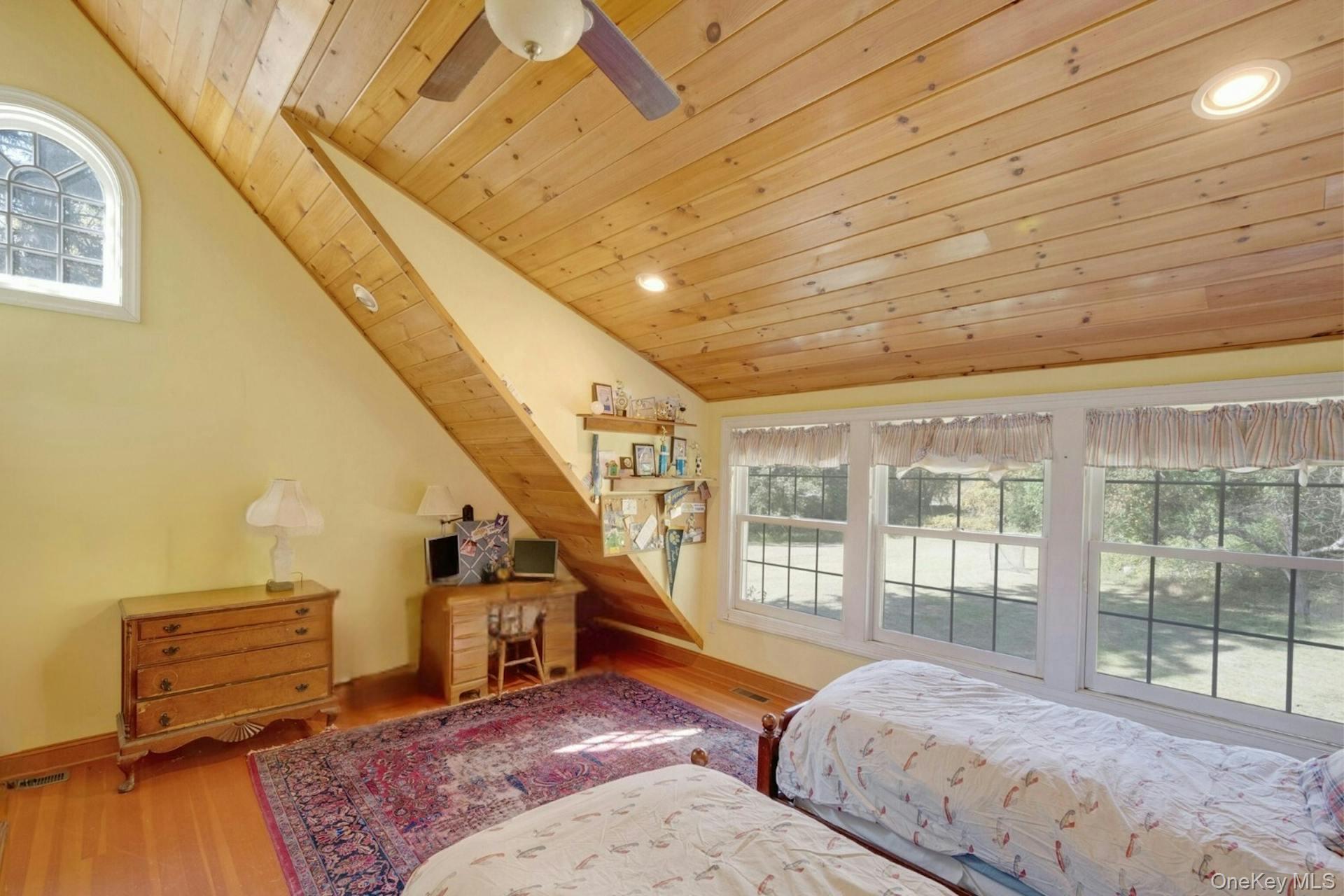 209 Hardscrabble Road North Salem, NY 10560 - Photo 23 of 40 a bedroom with furniture and a wooden floor