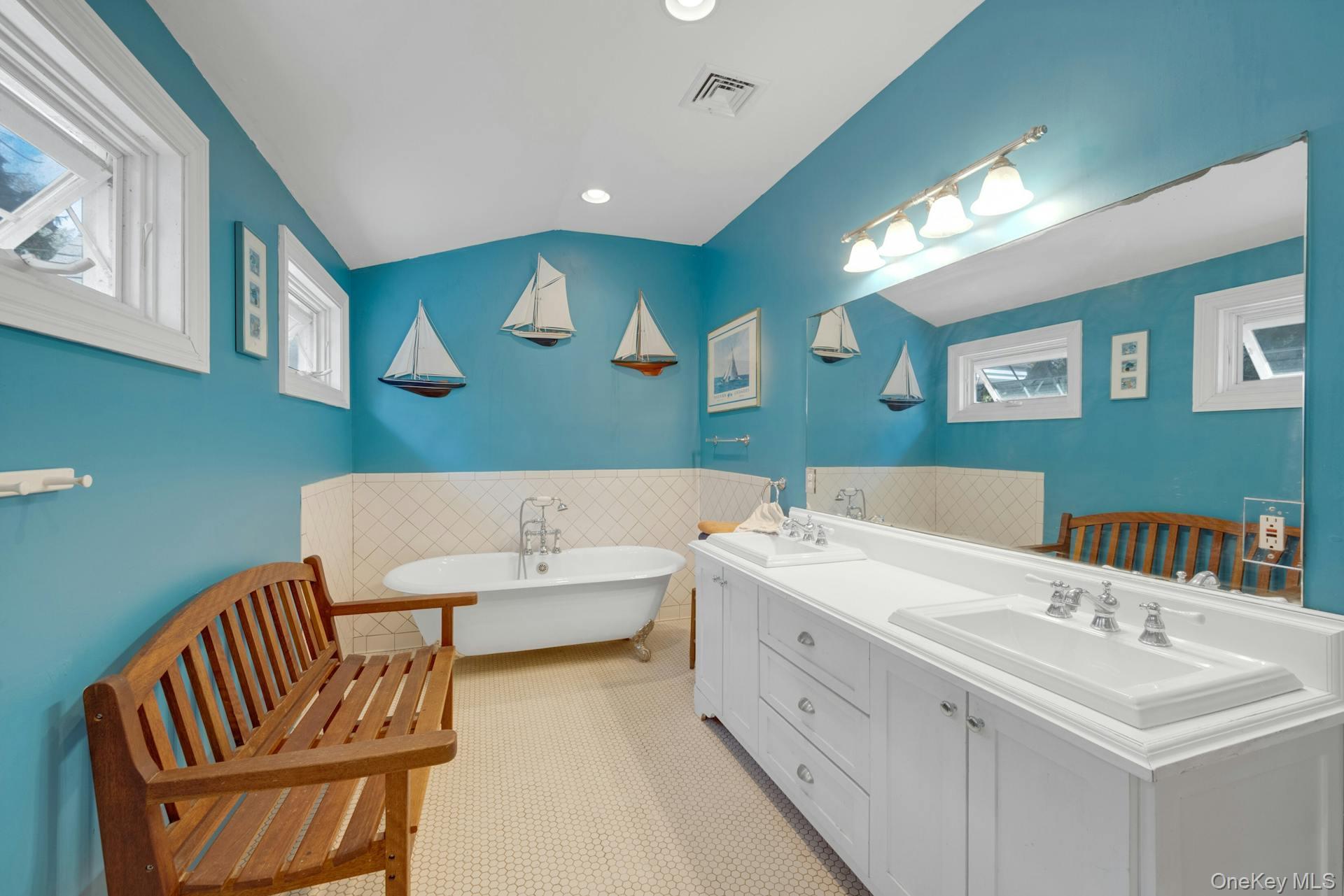 209 Hardscrabble Road North Salem, NY 10560 - Photo 25 of 40 a bathroom with a sink mirror and a bathtub