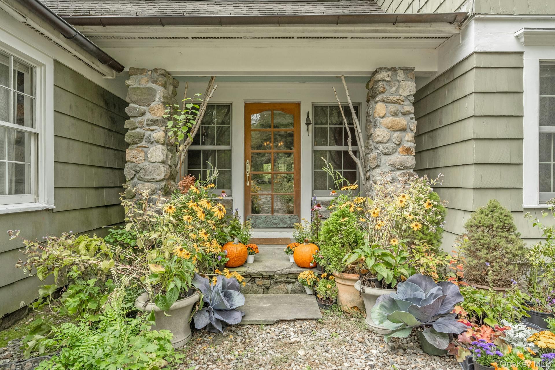 209 Hardscrabble Road North Salem, NY 10560 - Photo 4 of 40 a backyard of a house with outdoor seating