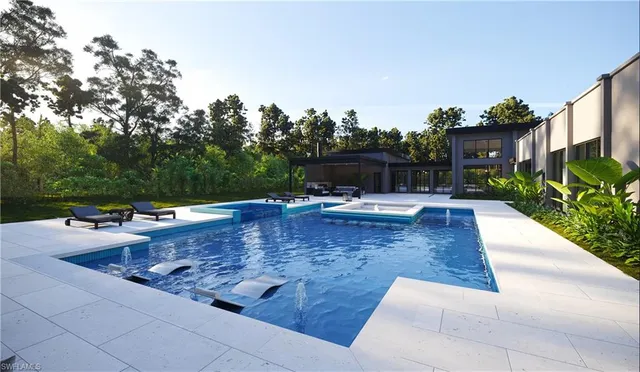 a view of a swimming pool with a patio