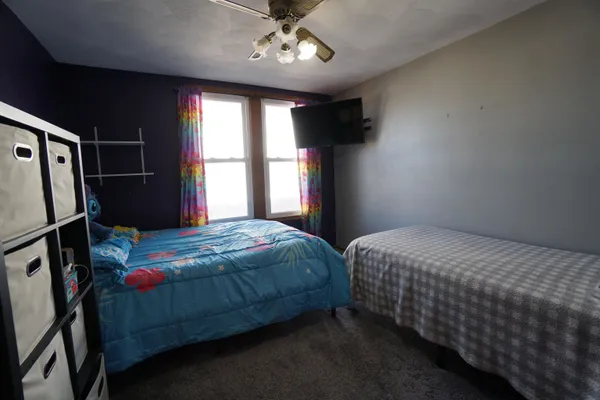 a view of entryway with a window and stairs