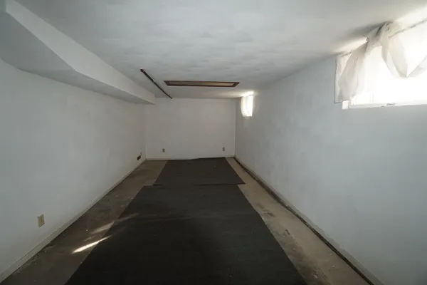 a kitchen with stainless steel appliances granite countertop a stove a refrigerator and a microwave