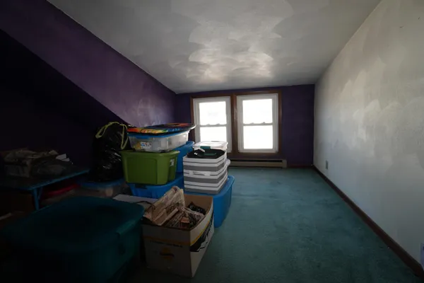 a view of a living room and dining room