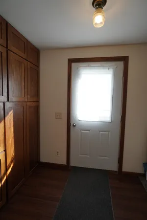 a kitchen that has a sink and a stove in it