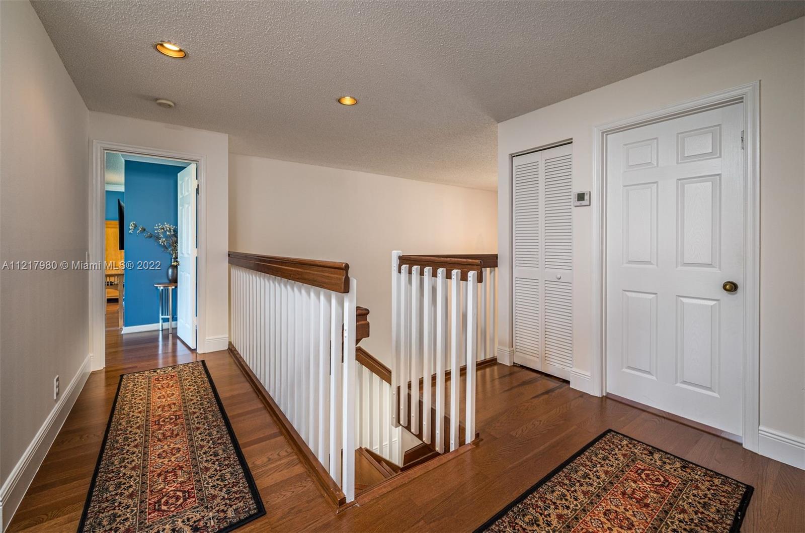 1418 Sandpiper Circle Weston, FL 33327 - Photo 13 of 31 wooden floor in a hall with an entryway