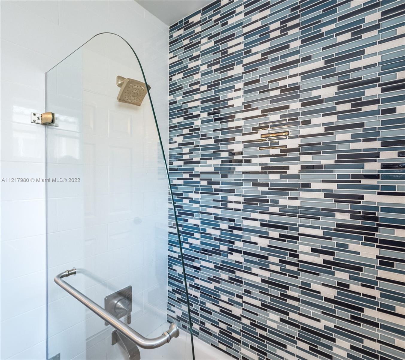 1418 Sandpiper Circle Weston, FL 33327 - Photo 20 of 31 a bathroom with a shower