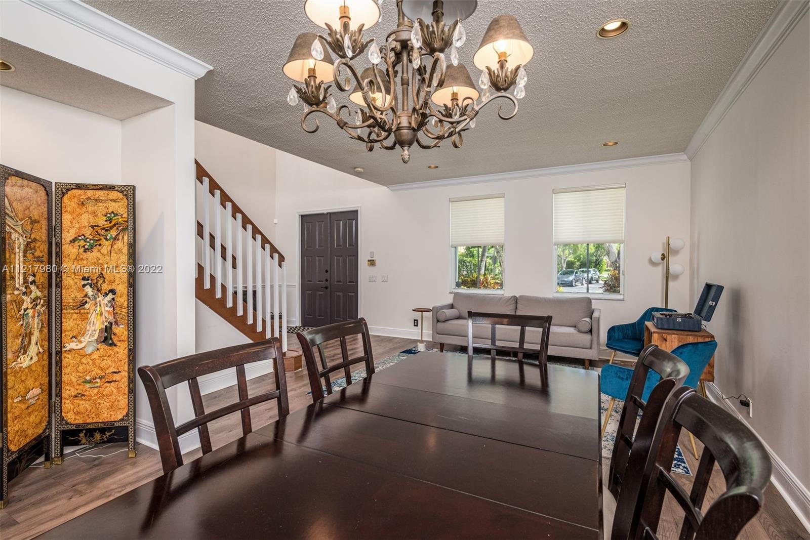 1418 Sandpiper Circle Weston, FL 33327 - Photo 5 of 31 a view of a dining room with furniture window and outside view