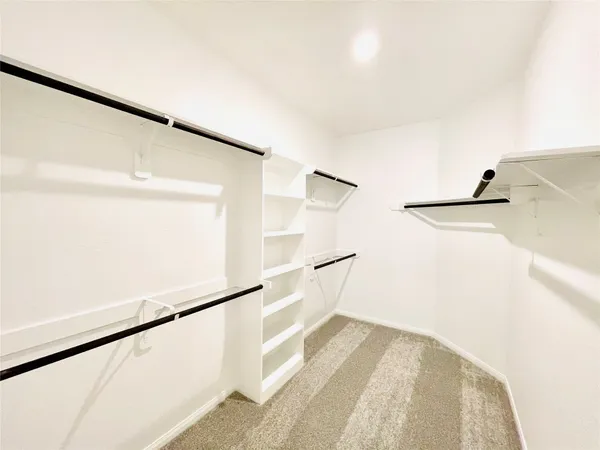 a view of a living room with a hallway