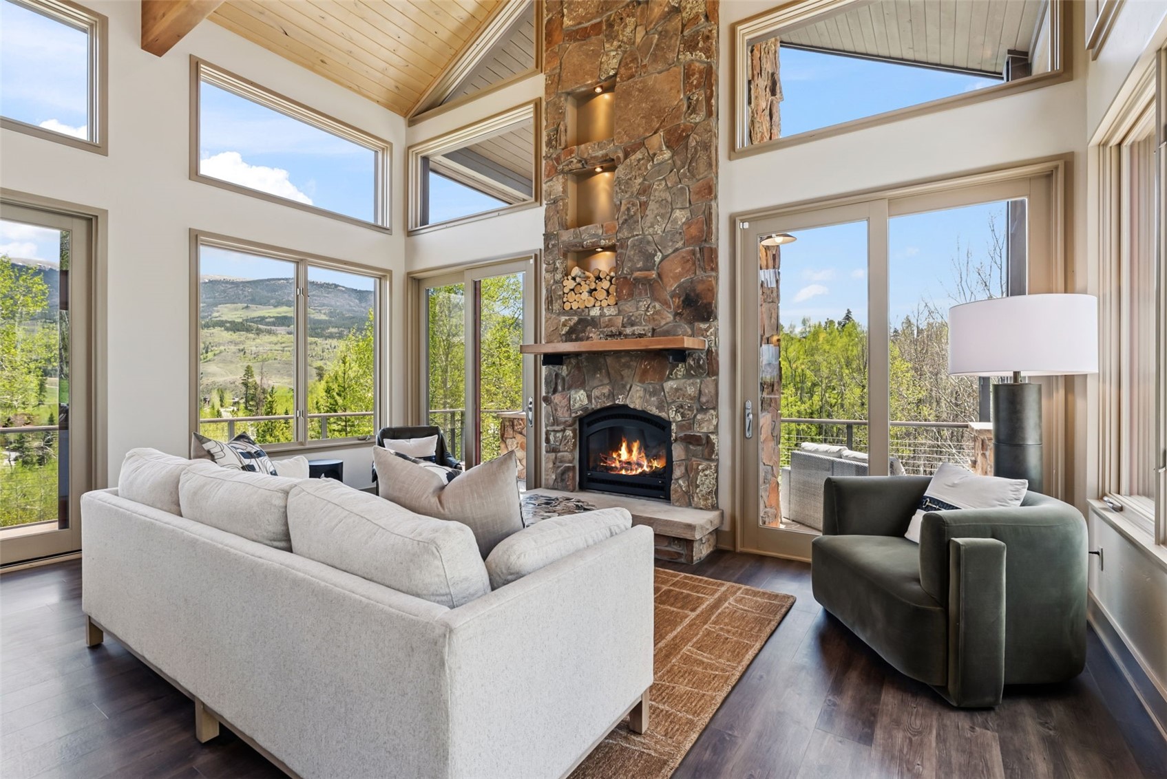 2800 Hunter's Knob Road Silverthorne, CO 80498 - Photo 7 of 37 a living room with furniture and a fireplace