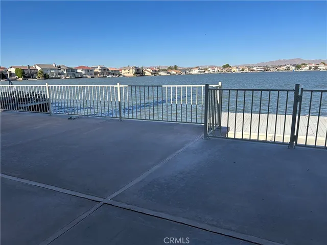 a view of a balcony with an ocean view