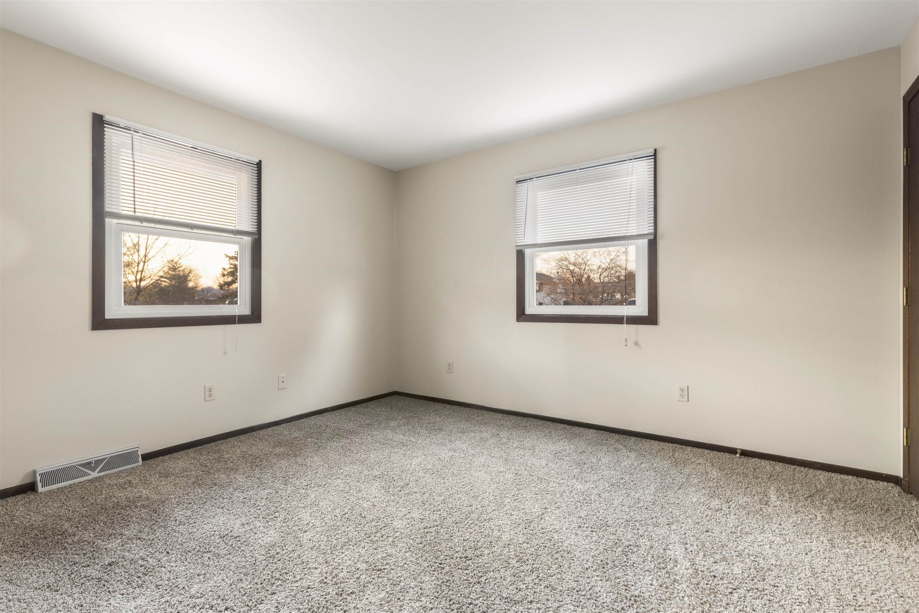 464 Valley Forge Trail Rockton, IL 61072 - Photo 7 of 24 a view of an empty room with a window