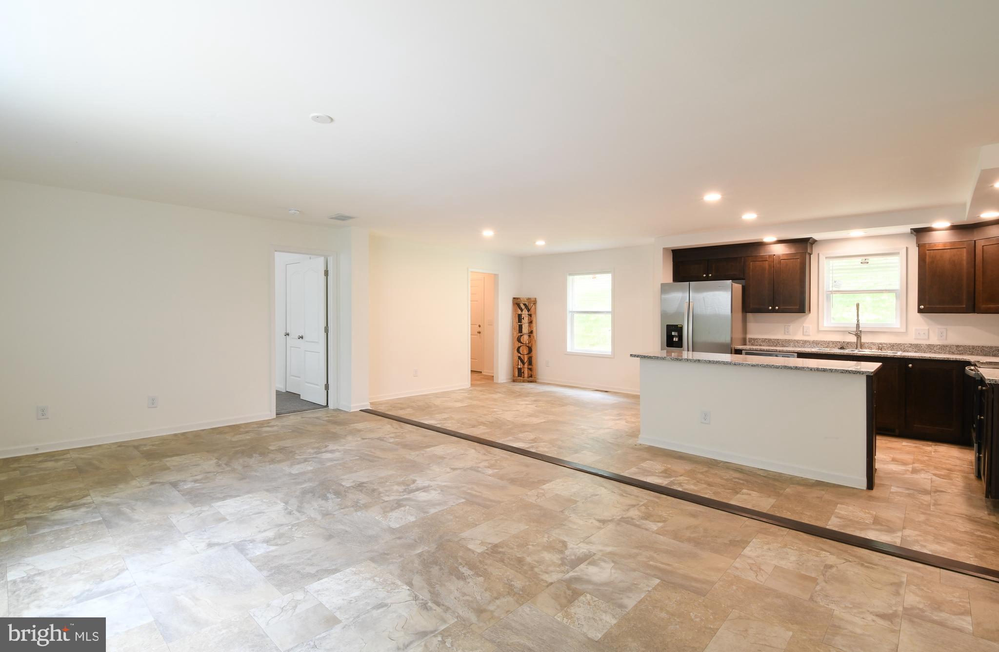 26269 Hill Road Ruther Glen, VA 22546 - Photo 6 of 27 Living Room View into Kitchen/Dinning