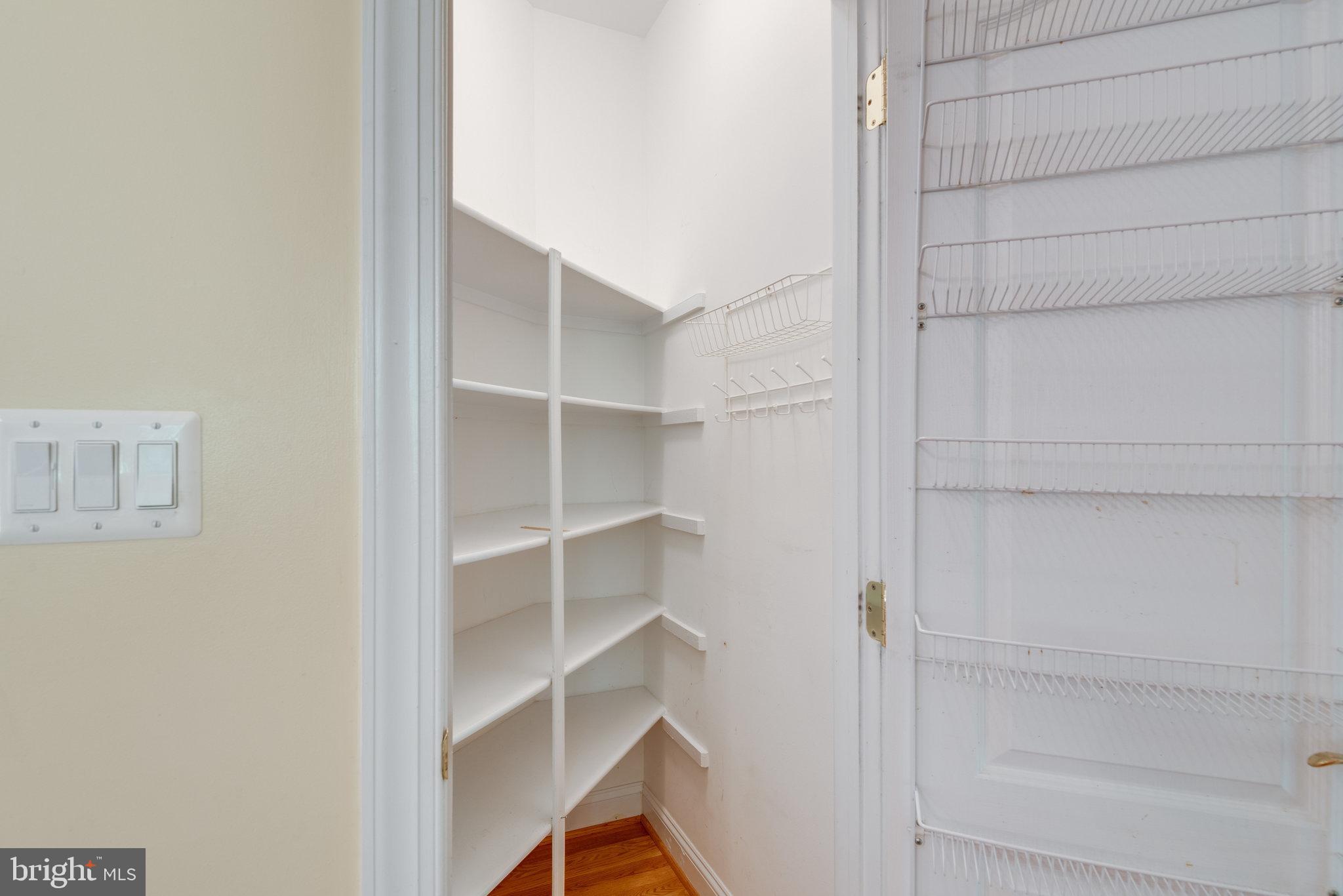 12104 North Walnut Branch Road Reston, VA 20194 - Photo 20 of 70 Kitchen pantry with shelving.