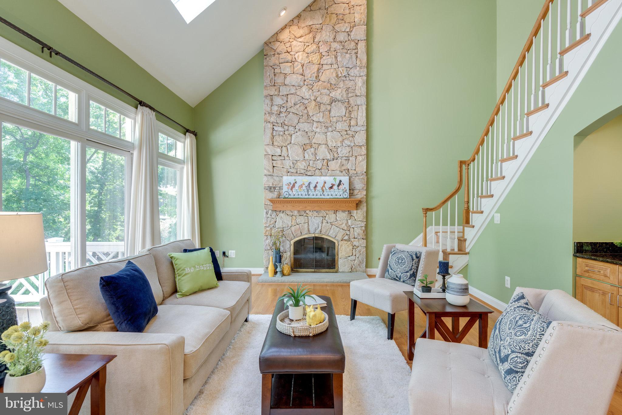 12104 North Walnut Branch Road Reston, VA 20194 - Photo 25 of 70 Family Room has a stone-faced fireplace.