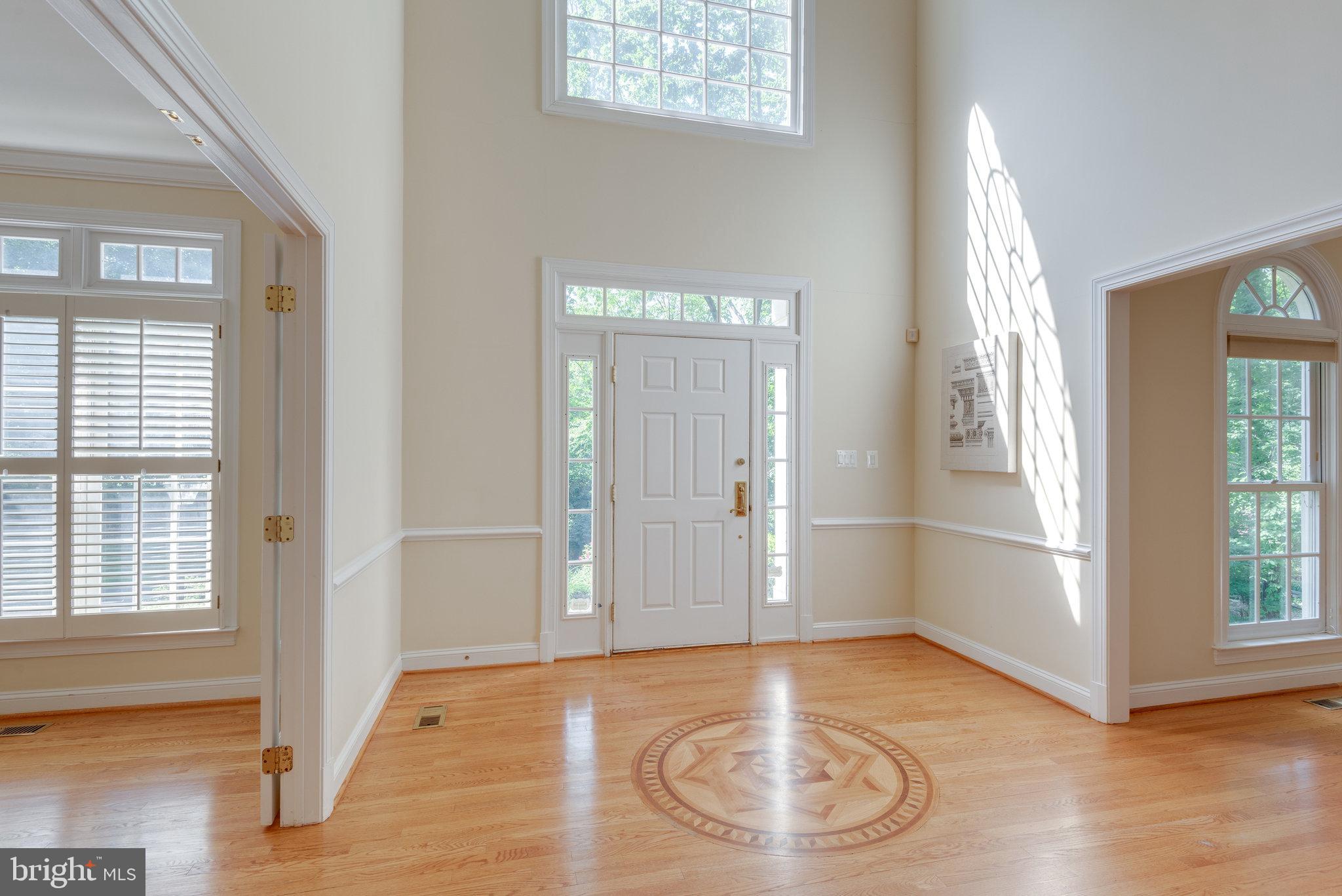 12104 North Walnut Branch Road Reston, VA 20194 - Photo 3 of 70 Foyer has inlaid wood medallion