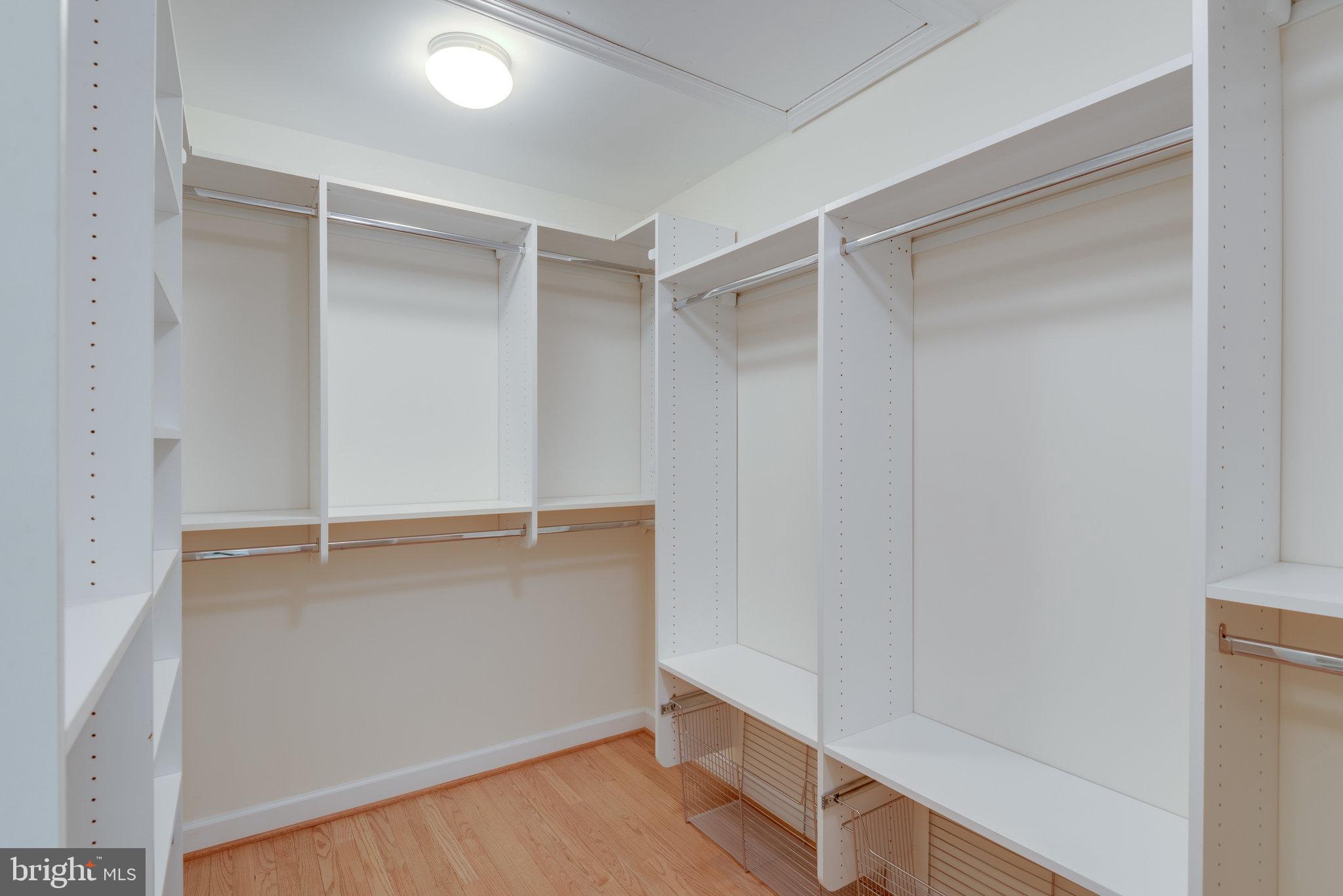 12104 North Walnut Branch Road Reston, VA 20194 - Photo 36 of 70 Walk-in primary bedroom closet accessed from bath