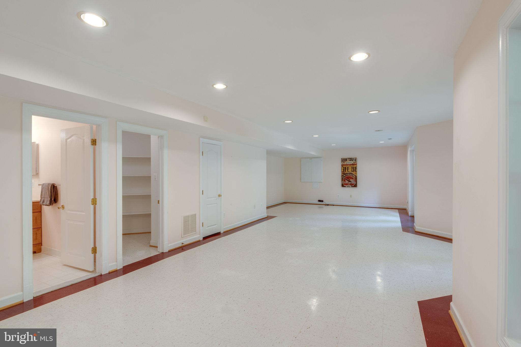 12104 North Walnut Branch Road Reston, VA 20194 - Photo 51 of 70 Tile floor with decorative border tile.