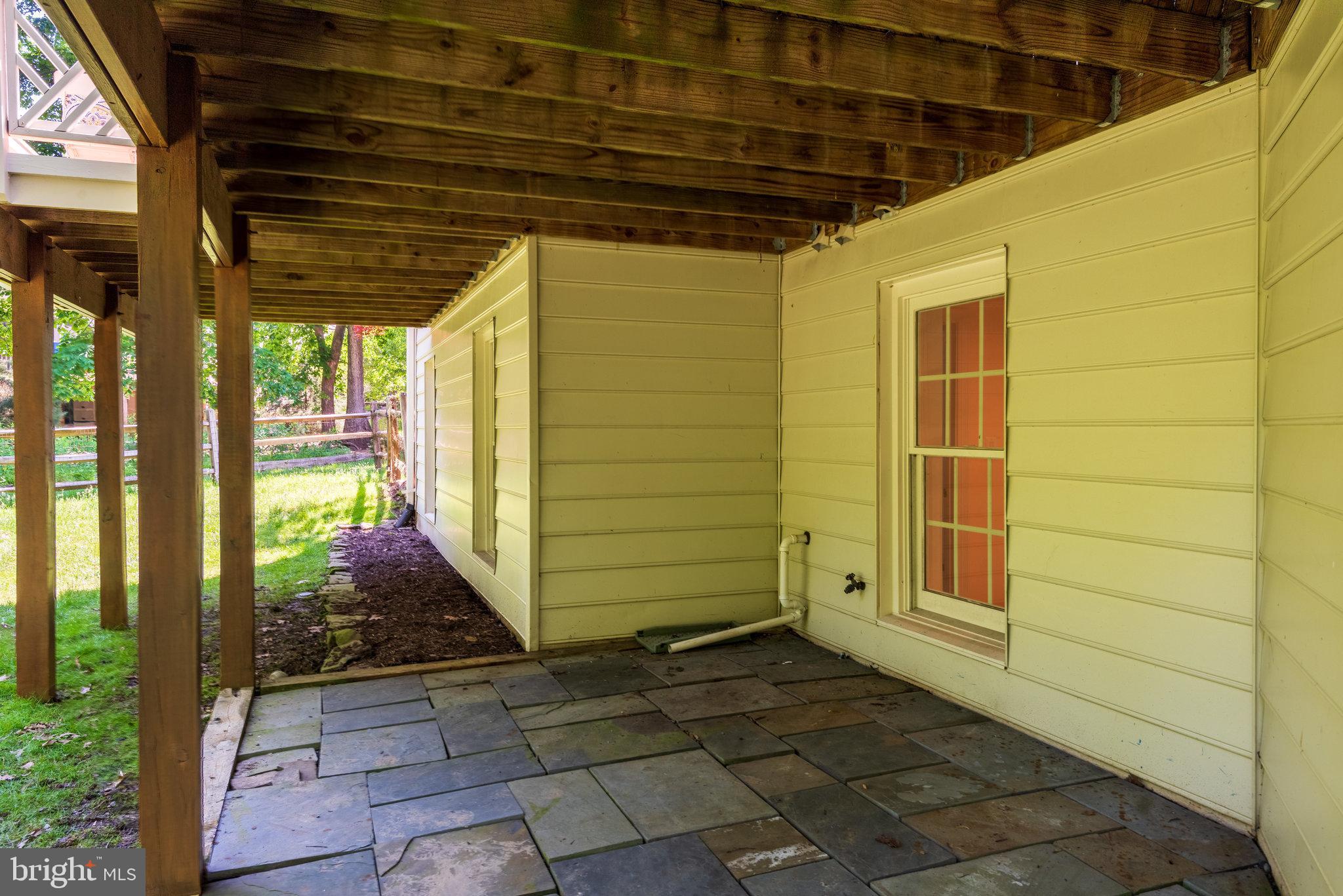 12104 North Walnut Branch Road Reston, VA 20194 - Photo 57 of 70 Slate pavers underneath deck
