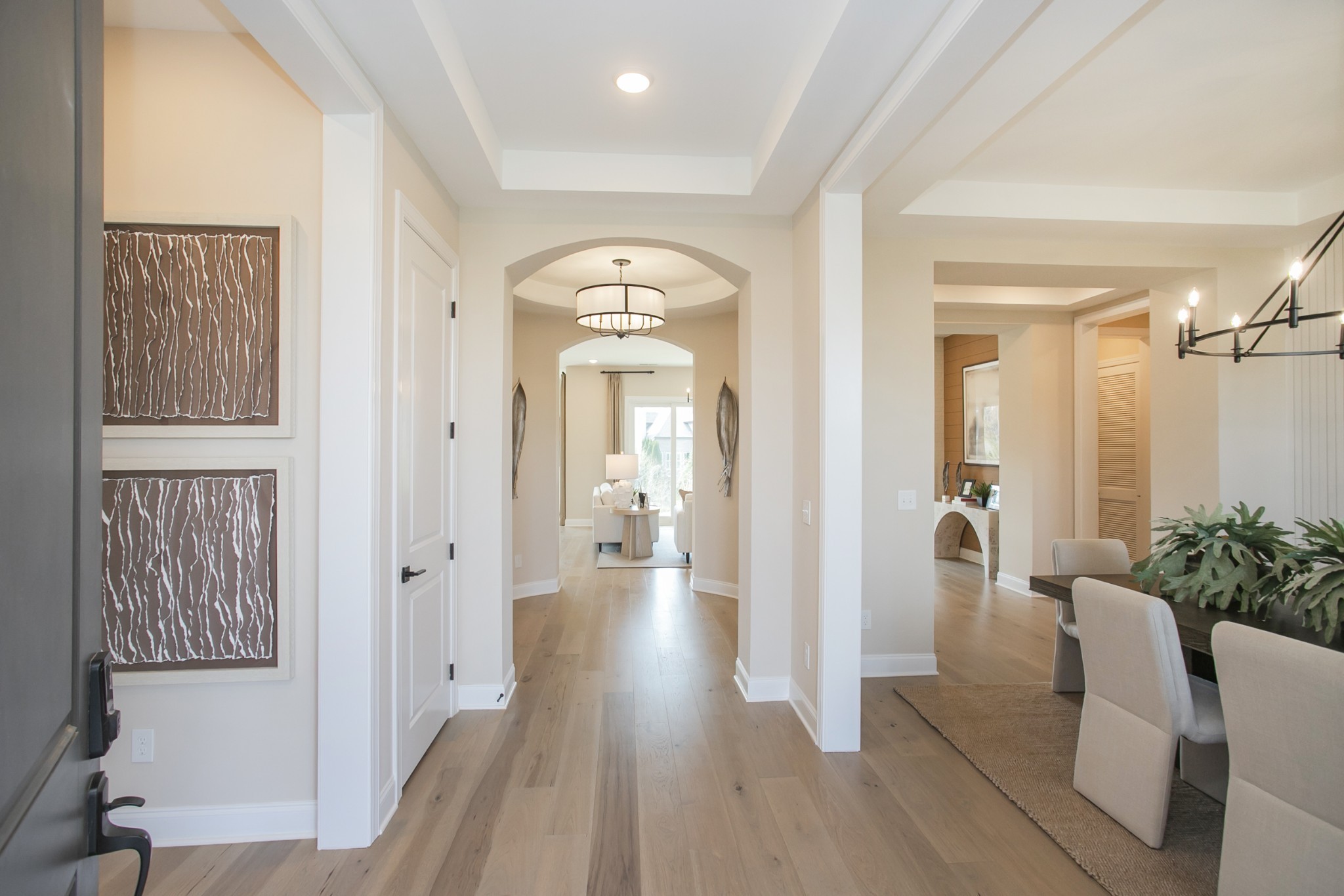1935 Harmony Road Spring Hill, TN 37174 - Photo 51 of 99 a view of a hallway with wooden floor and furniture