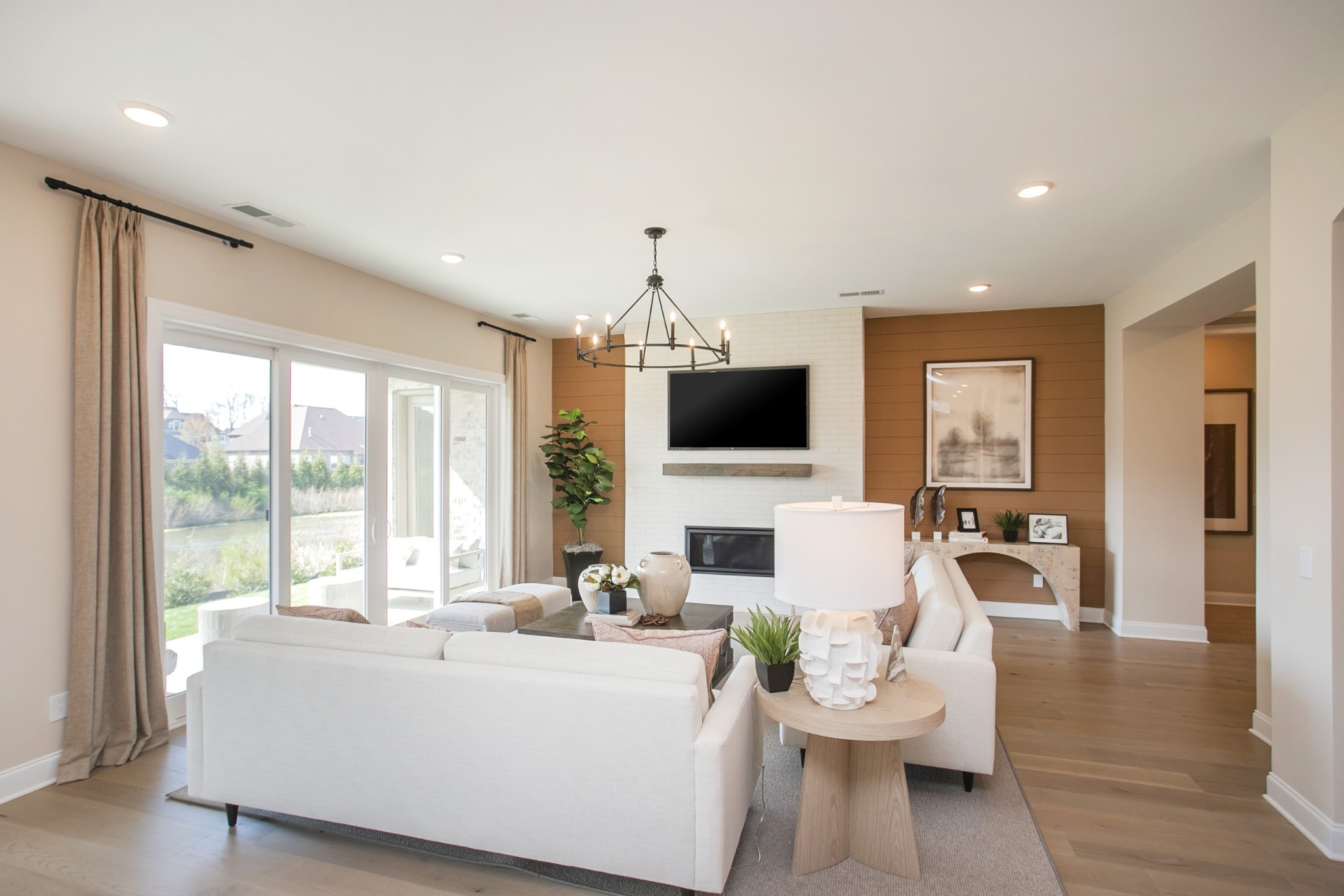 1935 Harmony Road Spring Hill, TN 37174 - Photo 56 of 99 a living room with furniture and a flat screen tv