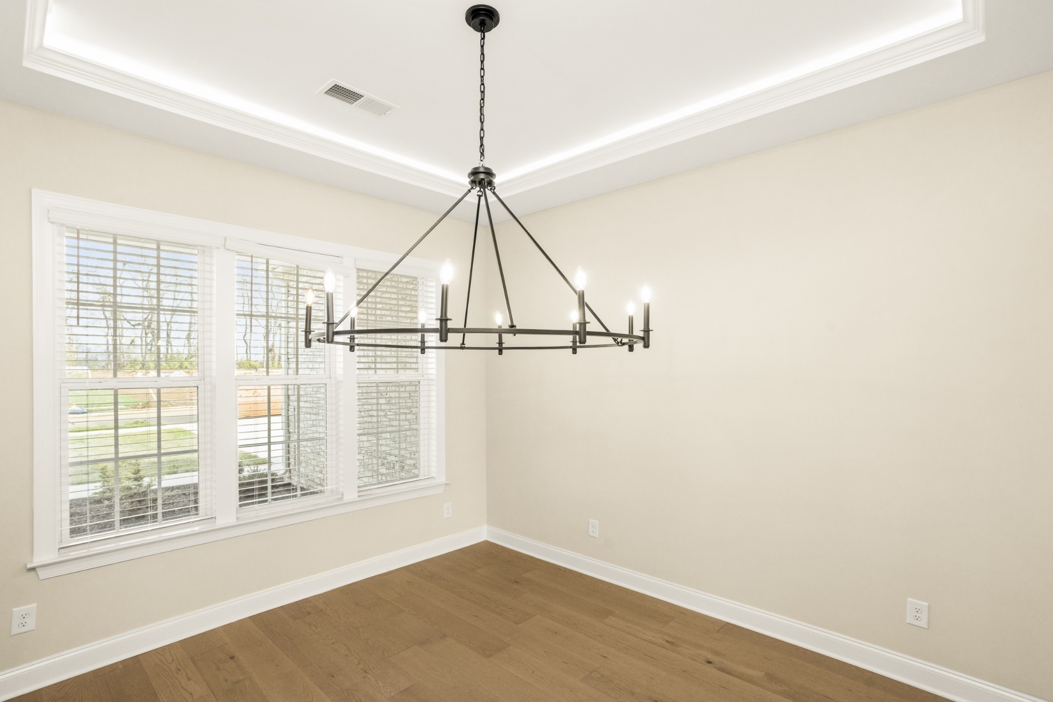 1935 Harmony Road Spring Hill, TN 37174 - Photo 6 of 99 a view of a room with a window and wooden floor