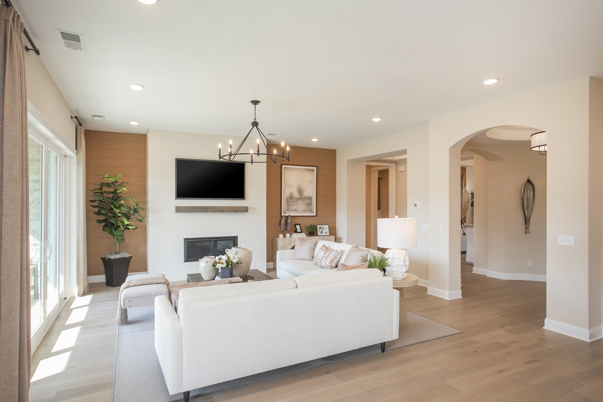 1935 Harmony Road Spring Hill, TN 37174 - Photo 67 of 99 a living room with furniture a flat screen tv and a view of kitchen