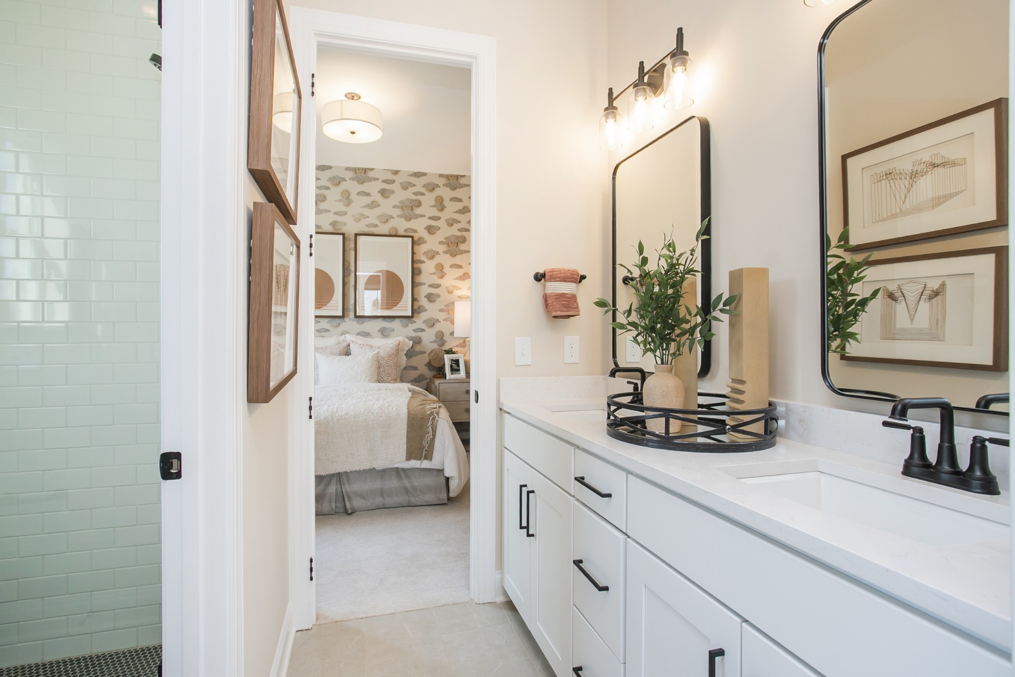 1935 Harmony Road Spring Hill, TN 37174 - Photo 79 of 99 a en suite bathroom with a double vanity sink and a mirror