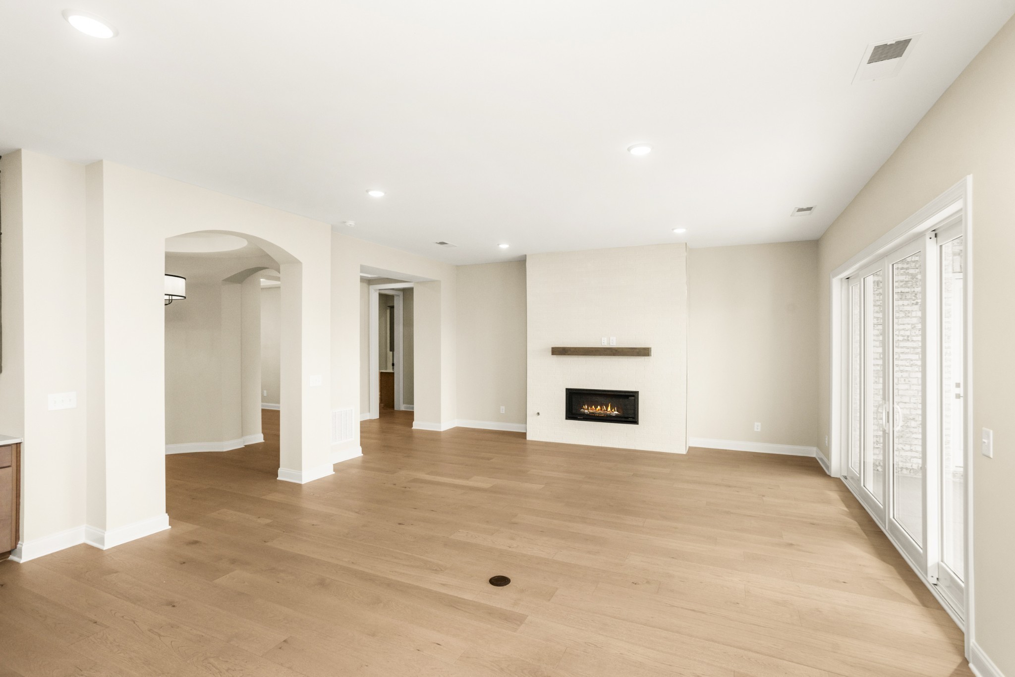 1935 Harmony Road Spring Hill, TN 37174 - Photo 9 of 99 a view of an empty room with a fireplace