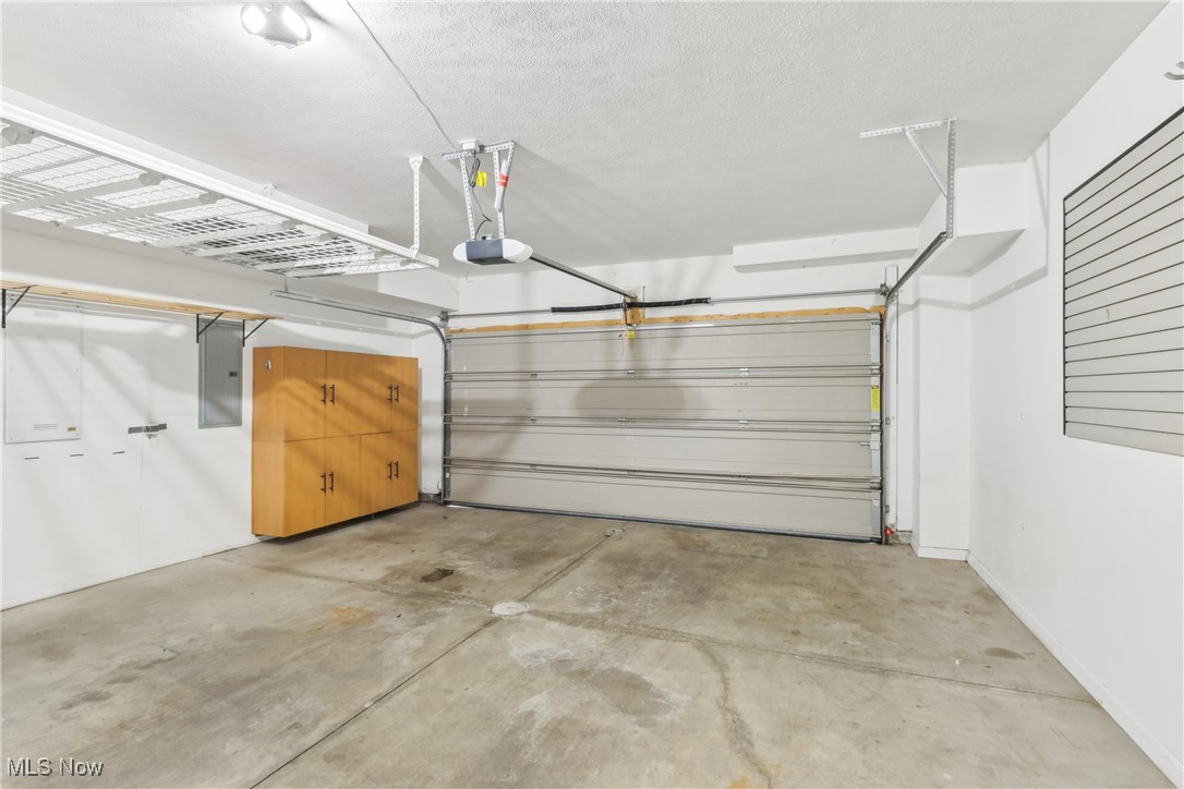 1852 Coltman Road Cleveland, OH 44106 - Photo 36 of 39 Two-car garage with plenty of storage, and lofted storage rack.