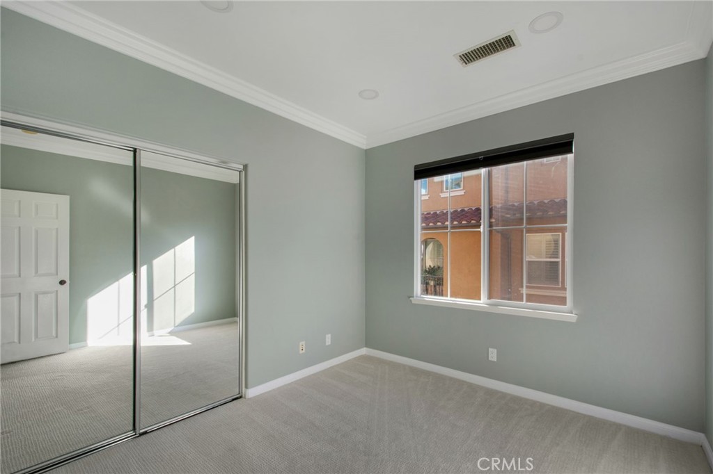 102 Roadrunner Irvine, CA 92603 - Photo 10 of 20 an empty room with window and an empty room