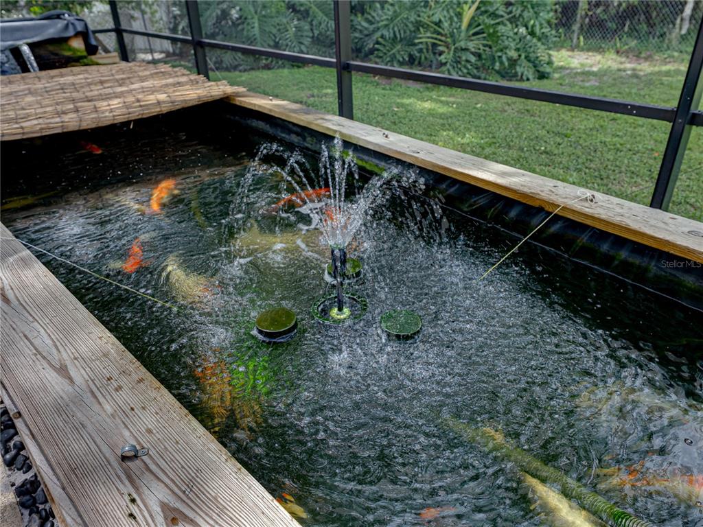 609 West Pipkin Road Lakeland, FL 33813 - Photo 55 of 72 a view of a wooden deck with a yard