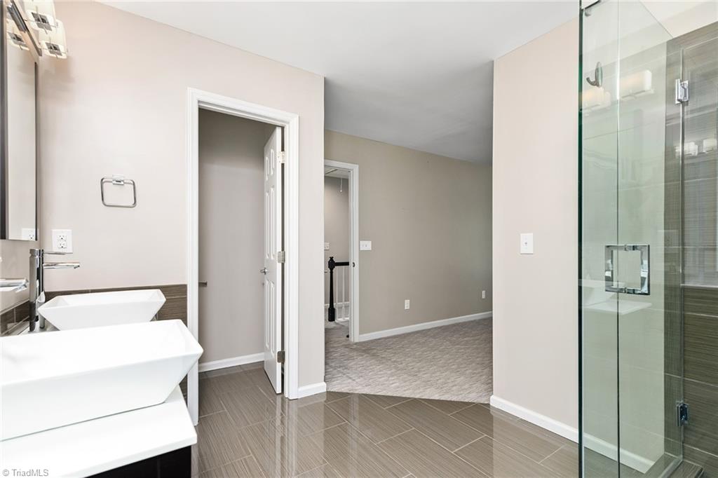 7435 Trotter Road Charlotte, NC 28216 - Photo 21 of 36 Primary Bathroom