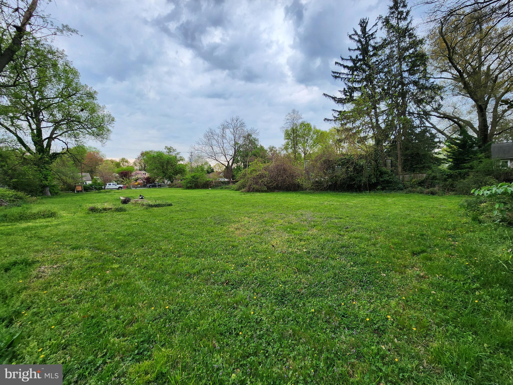 6422 Taylor Road Riverdale, MD 20737 - Photo 1 of 3 a view of a grassy field with trees