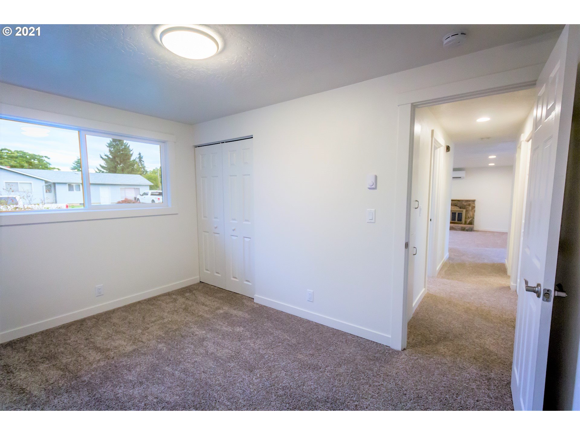 2302 Grovedale Drive Springfield, OR 97477 - Photo 26 of 29 a view of an empty room with a window