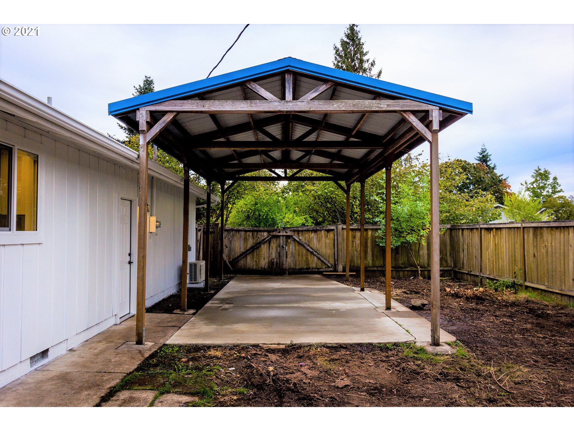 2302 Grovedale Drive Springfield, OR 97477 - Photo 5 of 29 a view of a wooden deck with a yard