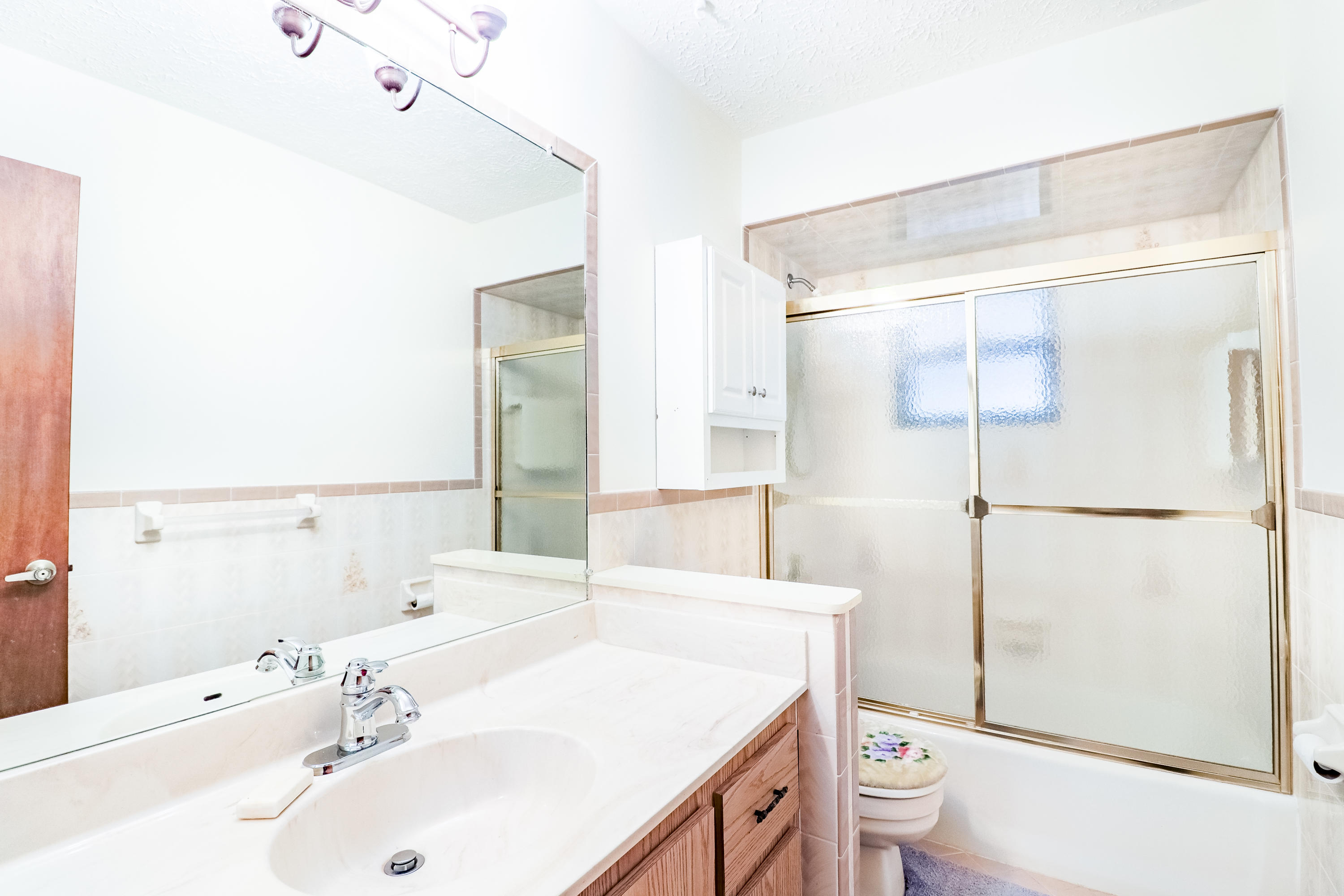 933 Southwest Bay State Road Port St. Lucie, FL 34953 - Photo 11 of 22 Bathroom 2