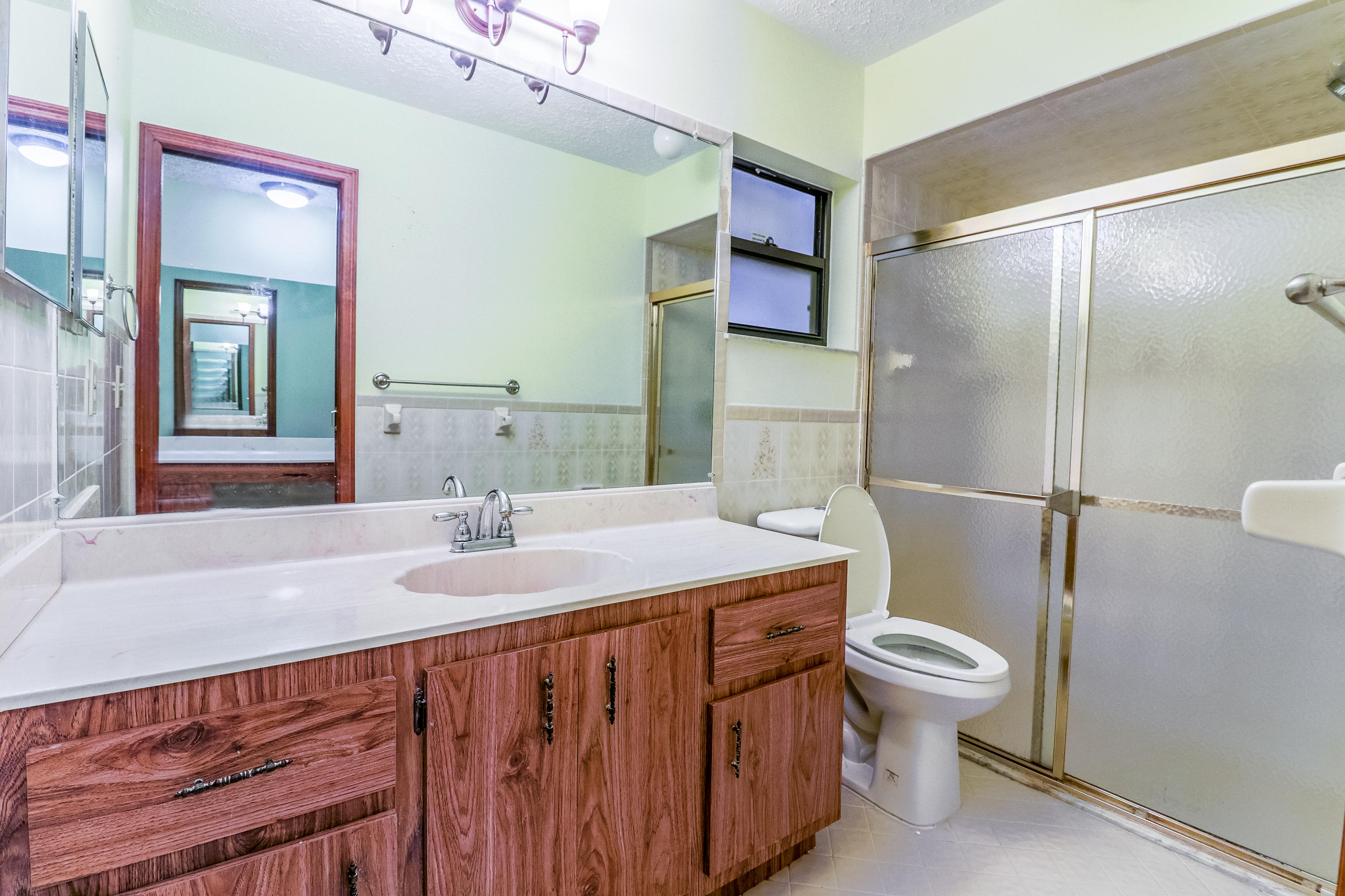 933 Southwest Bay State Road Port St. Lucie, FL 34953 - Photo 9 of 22 Master Bathroom