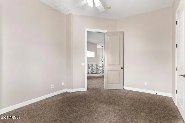an empty room with a bathroom