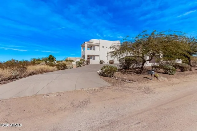 a view of a house with swimming pool